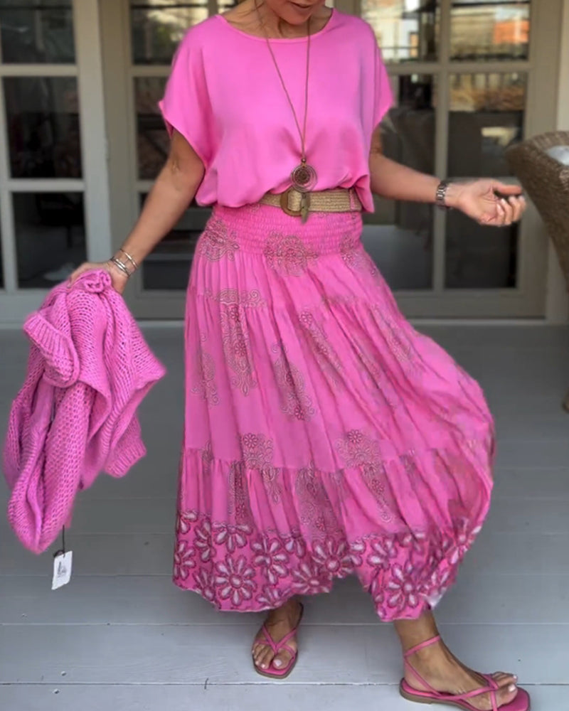 Jupe à empiècements fleuris et plis