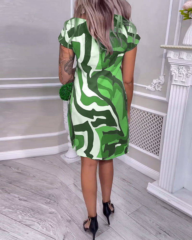 Robe à poches imprimées, col rond et manches raglan