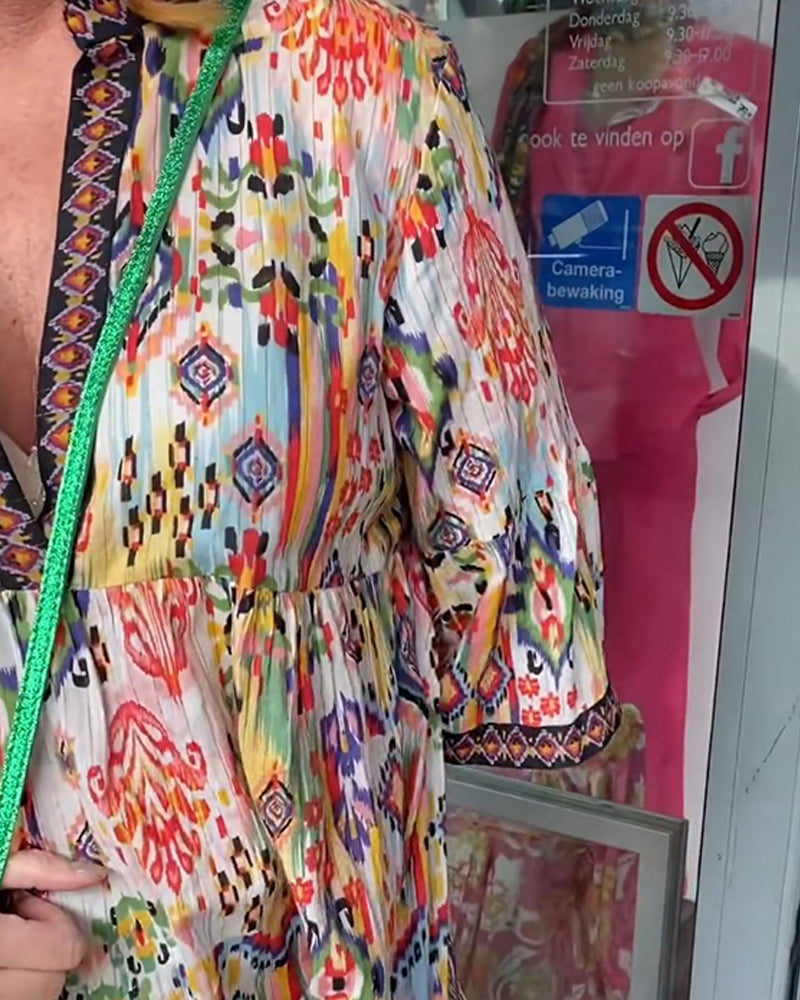 Robe longue élégante imprimée col V