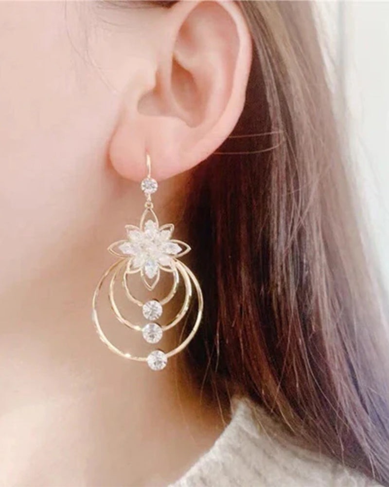Boucles d'oreilles trois créoles lotus en cristal