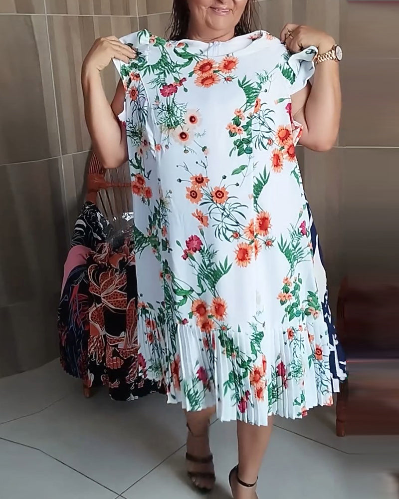 Robe plissée à imprimé floral et à empiècements