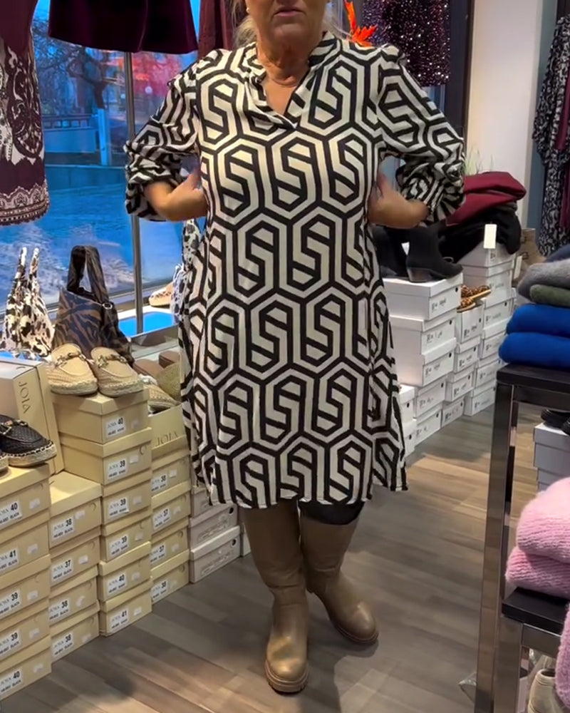 Robe élégante à col en V et motif géométrique