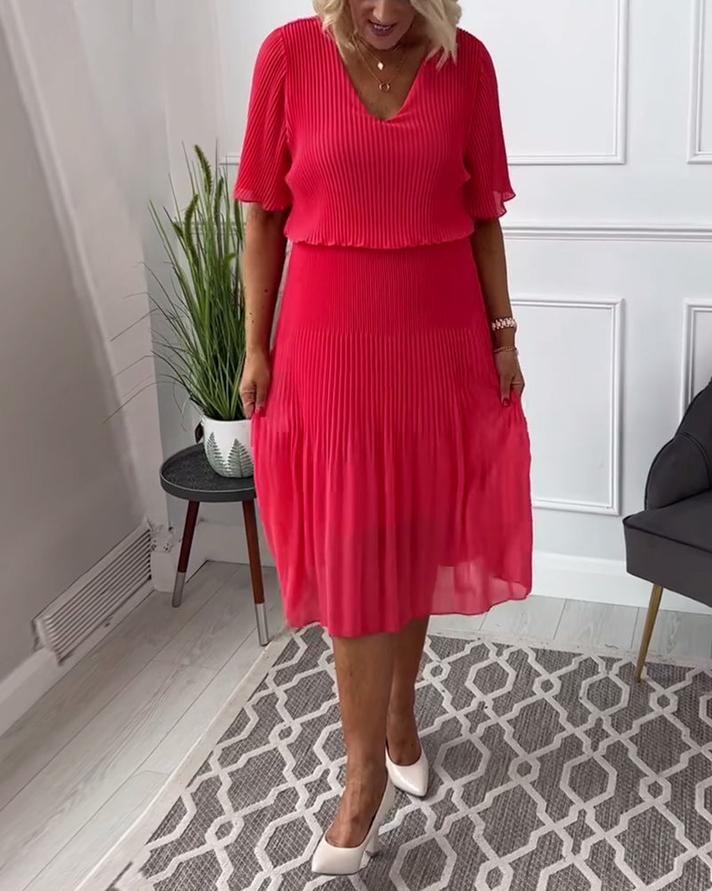 Robe plissée décontractée à col en V et demi-manches de couleur unie