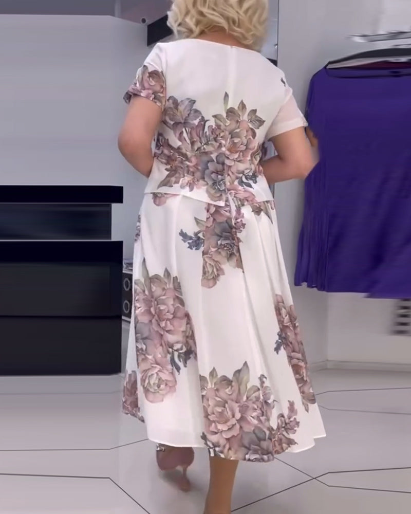 Robe élégante à col rond et imprimé floral