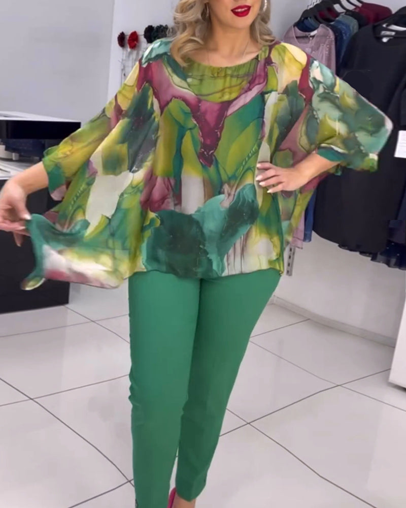 Blouse imprimée à col rond et manches chauve-souris