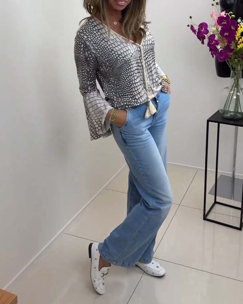 Blouse à motif floral et lanière