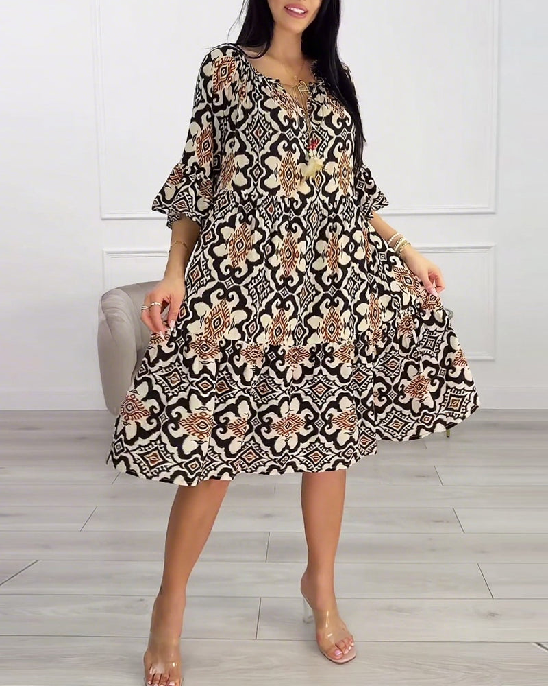 Robe imprimée vintage longueur genou