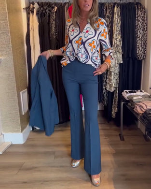 Blouse à col en V et à motif floral