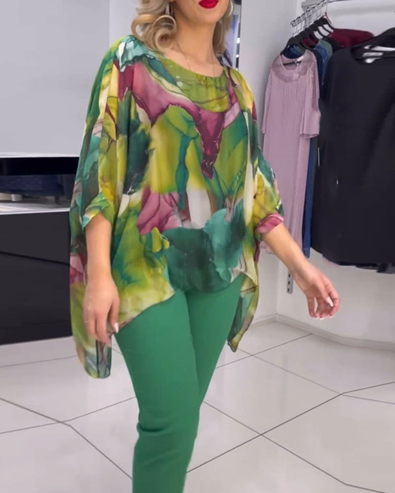 Blouse imprimée à col rond et manches chauve-souris