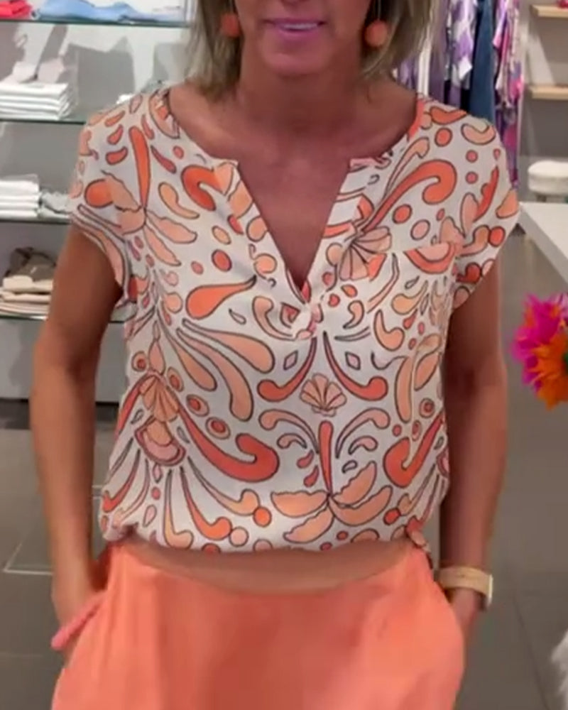 Blouse décontractée imprimée à col en V et manches raglan