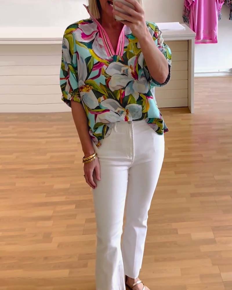 Blouse à manches mi-longues et col montant à imprimé floral