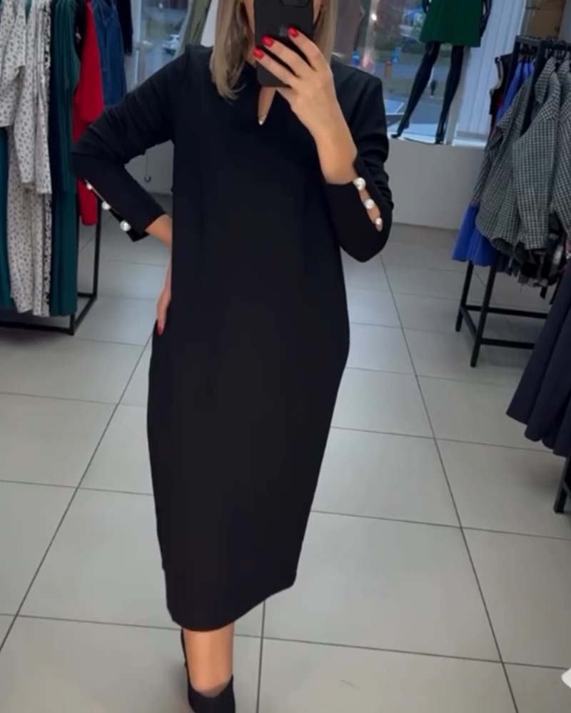 Robe élégante avec boutons en perles