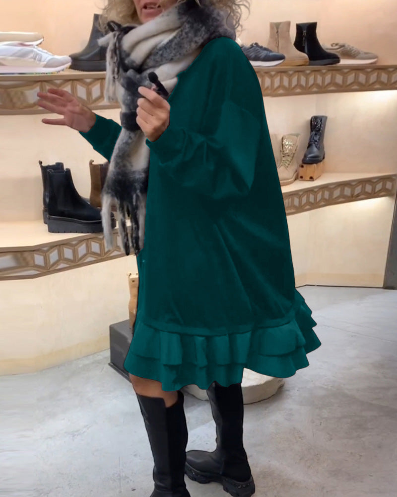 Robe à la silhouette élégante et aux manches longues