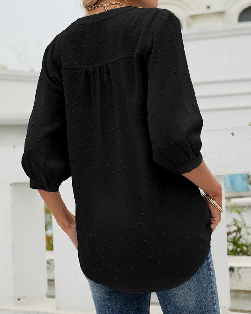 Chemise à col montant et manches mi-longues