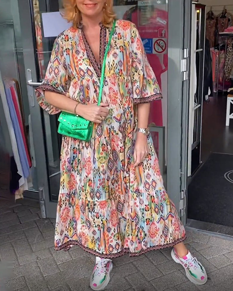 Robe longue élégante imprimée col V
