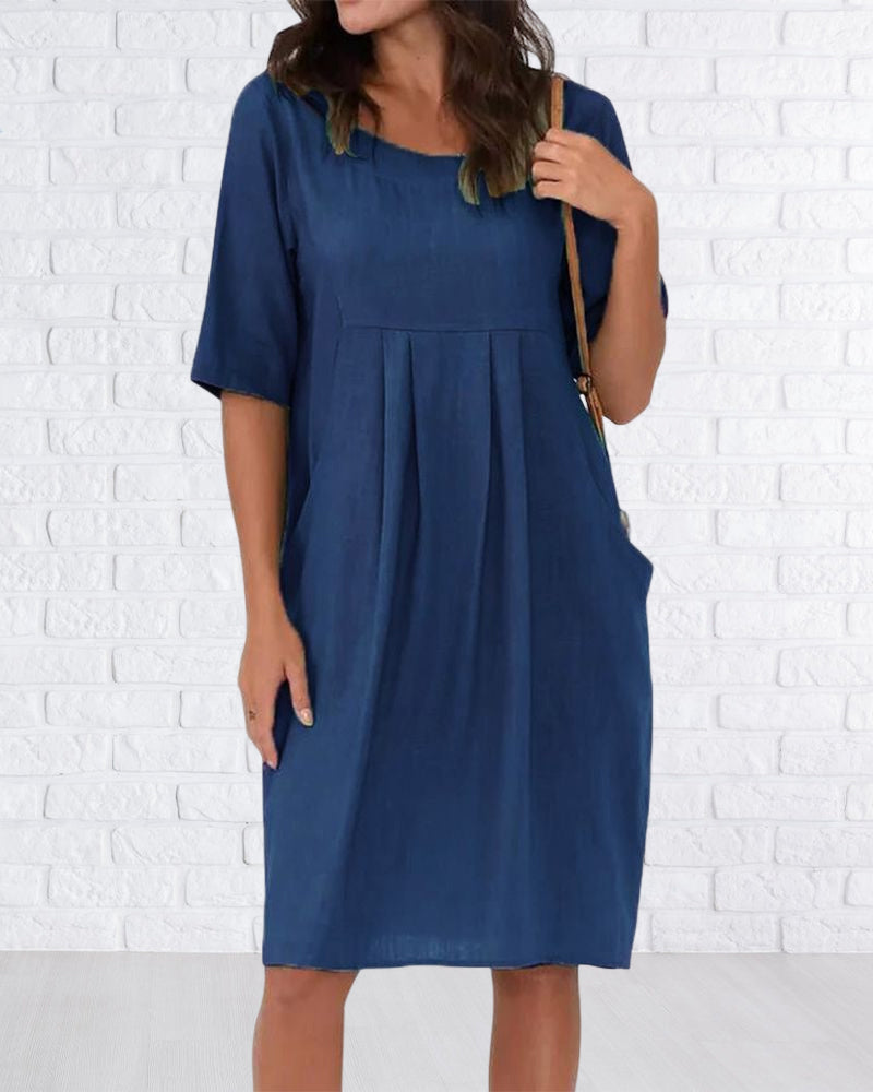 Robe de couleur unie à col rond avec poches