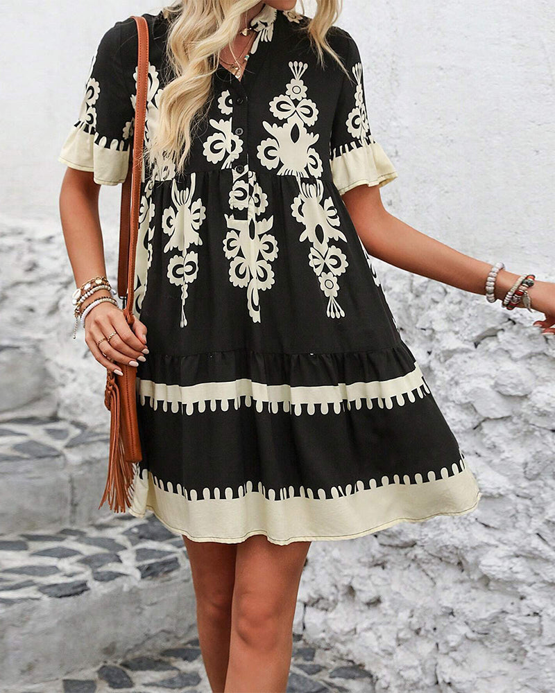 Robe élégante boutonnée à manches courtes imprimée