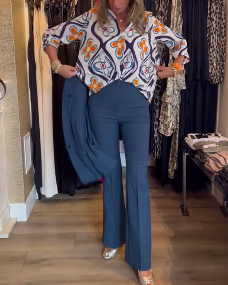 Blouse à col en V et à motif floral