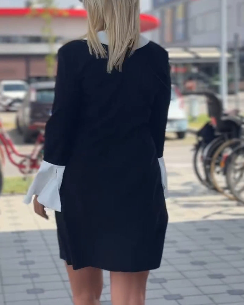 Robe élégante à revers contrastés et manches cloche