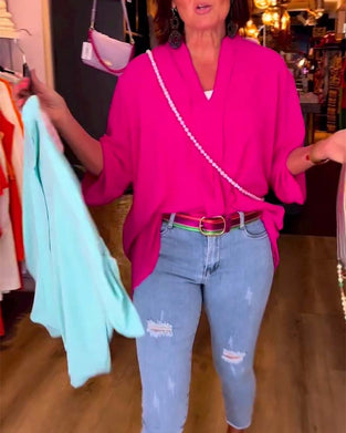 Blouse décontractée de couleur unie avec col en V et manches trois-quarts