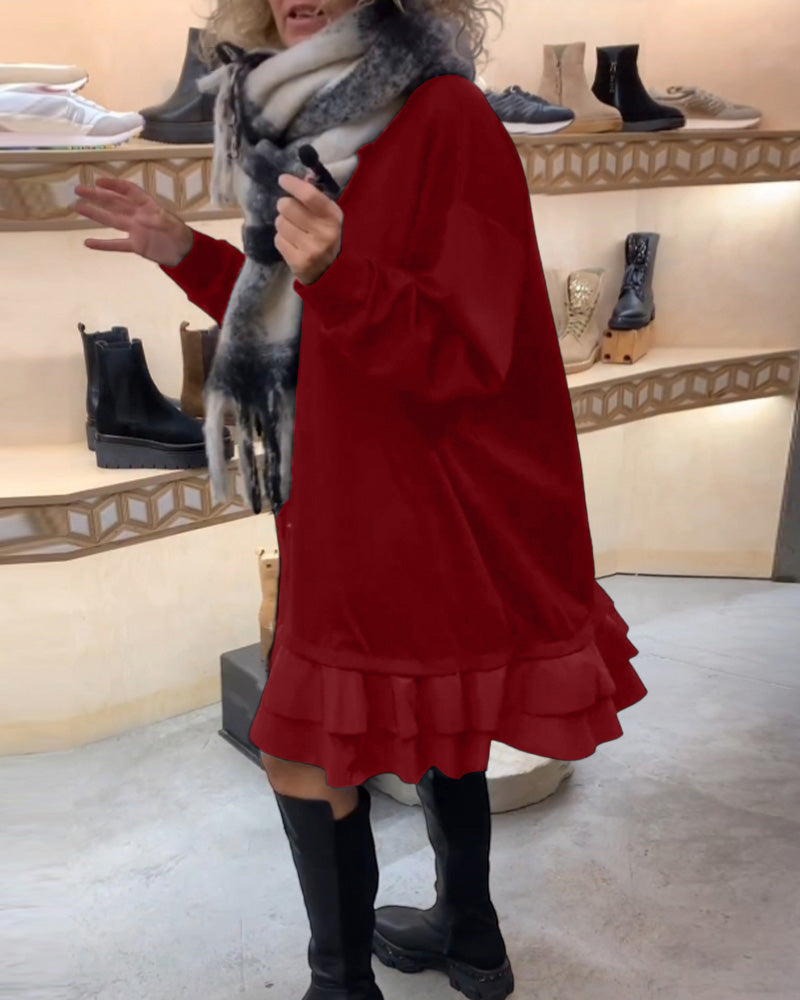 Robe à la silhouette élégante et aux manches longues