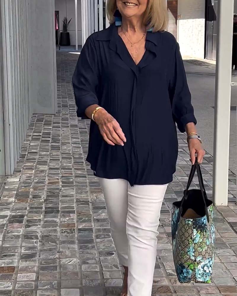 Blouse ample de couleur unie à revers