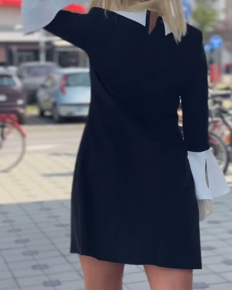 Robe élégante à revers contrastés et manches cloche