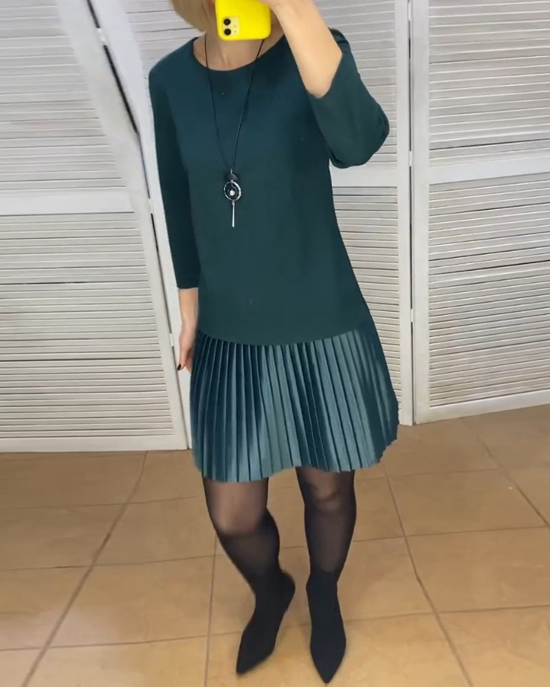 Robe à pans plissés et couleurs unies