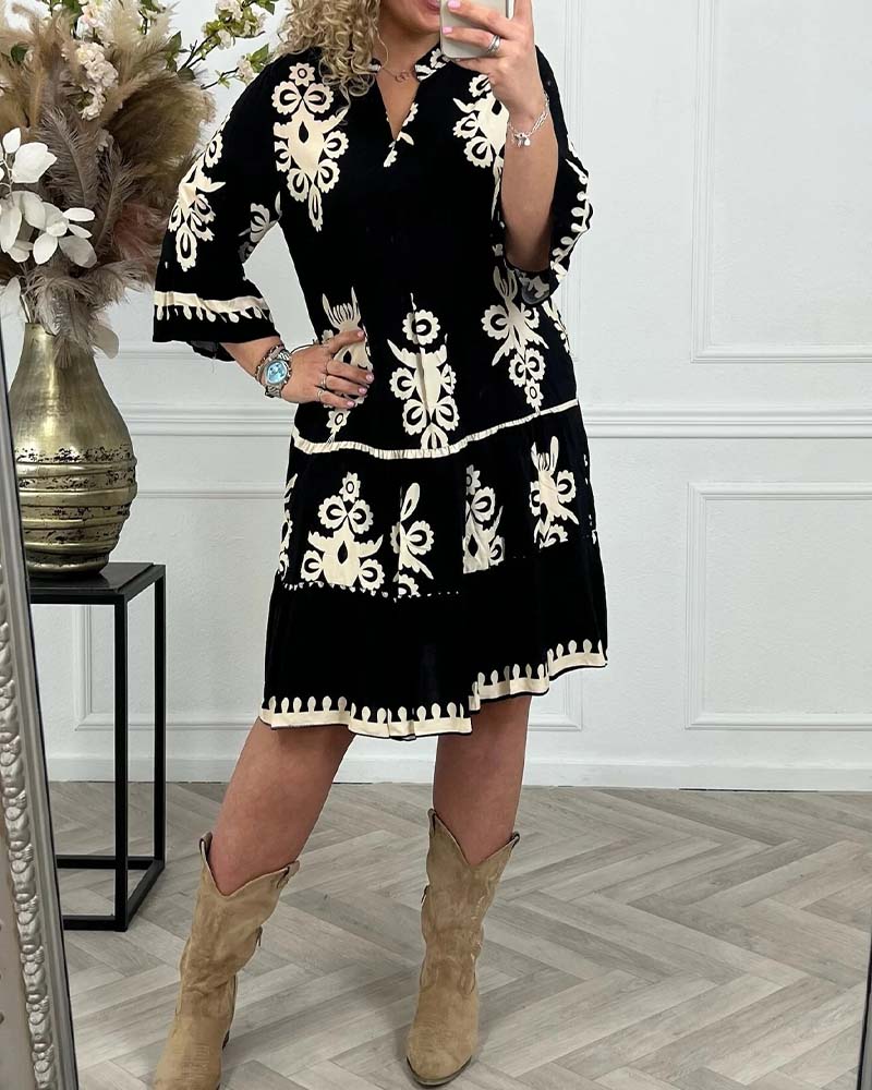 Robe élégante imprimée col V