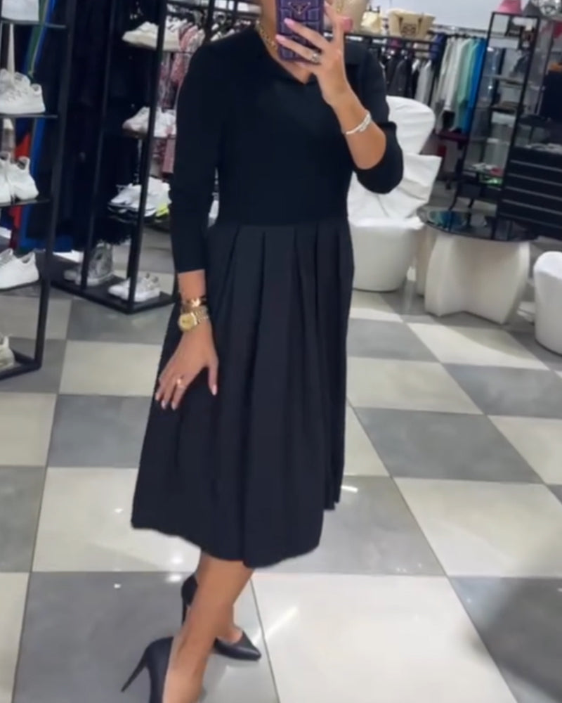 Robe plissée à empiècements et col en V