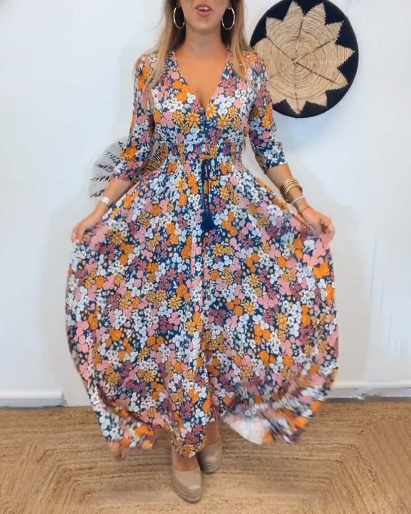 Robe à décolleté en V profond et à fleurs