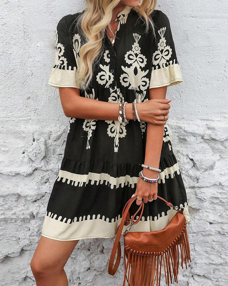 Robe élégante boutonnée à manches courtes imprimée