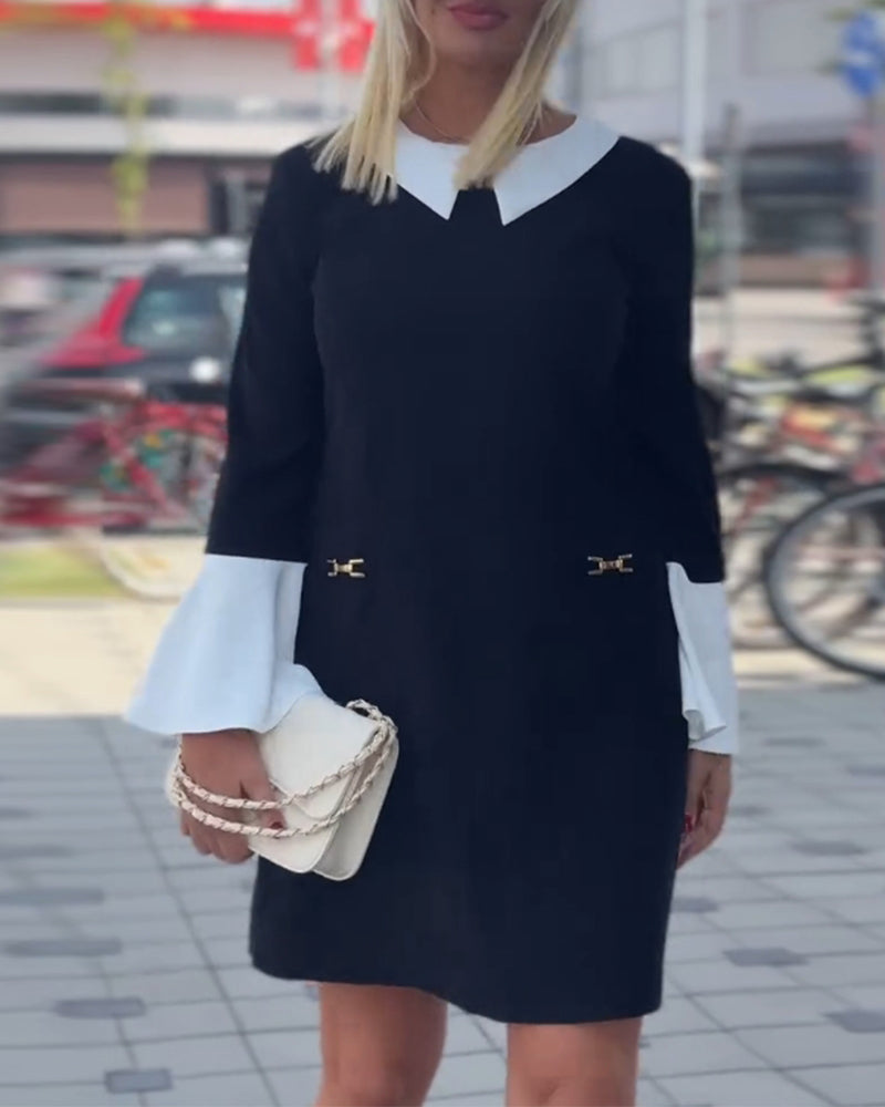 Robe élégante à revers contrastés et manches cloche