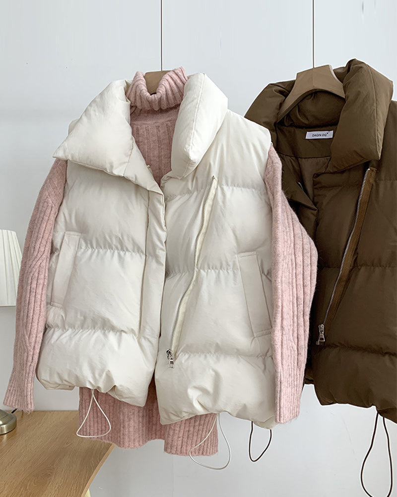 Veste matelassée simple sans manches avec poche zippée de couleur unie