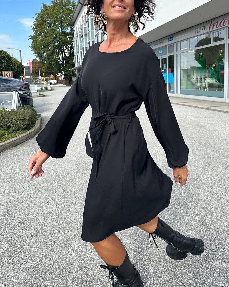 Robe unie col rond nouée