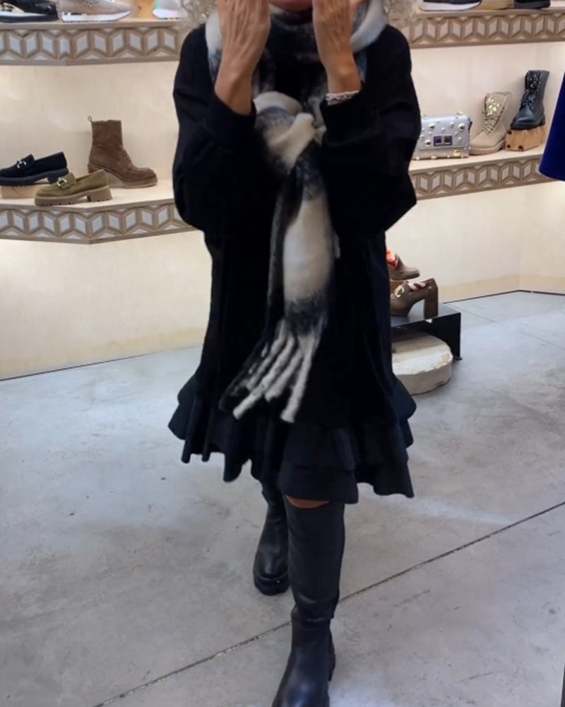 Robe à la silhouette élégante et aux manches longues