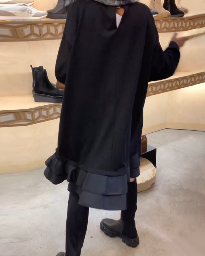 Robe à la silhouette élégante et aux manches longues