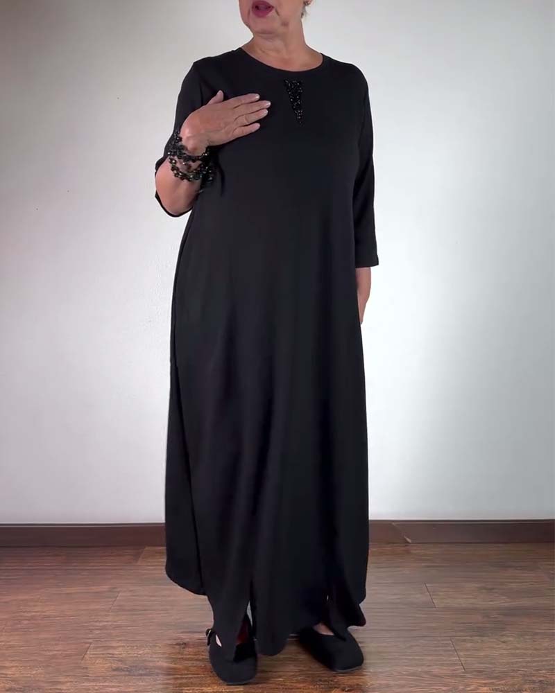 Robe ample à col rond de couleur unie