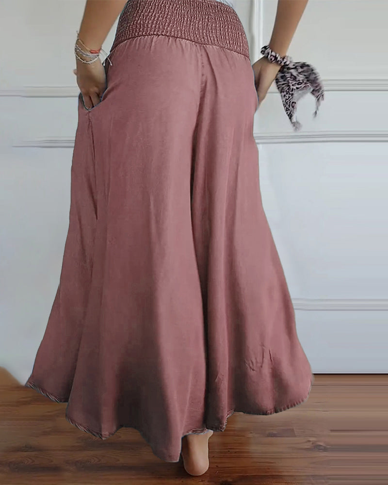 Pantalon à taille élastiquée et jambes larges
