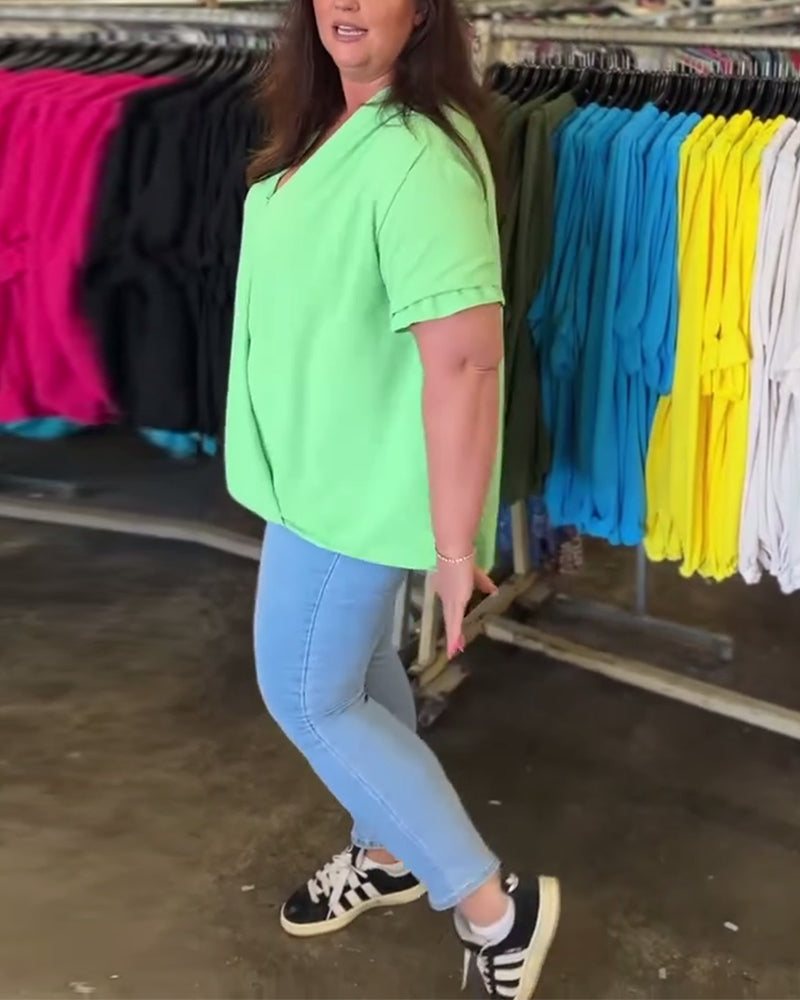 Blouse décontractée de couleur unie à volants et col en V