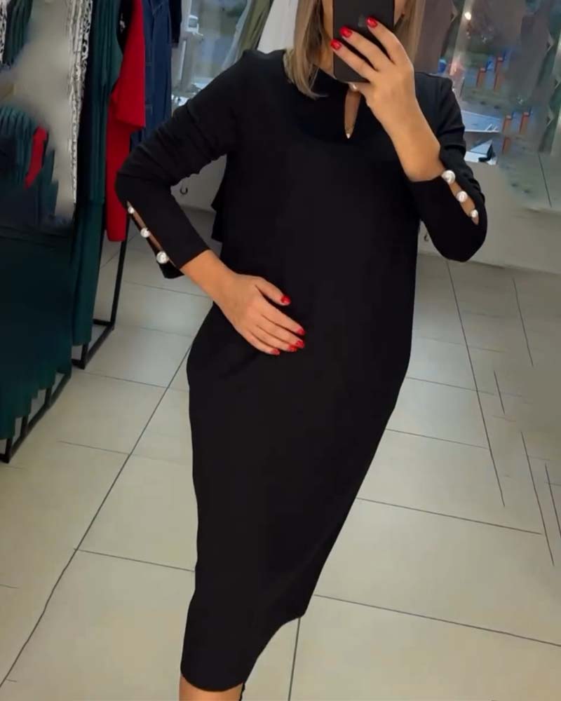 Robe élégante avec boutons en perles