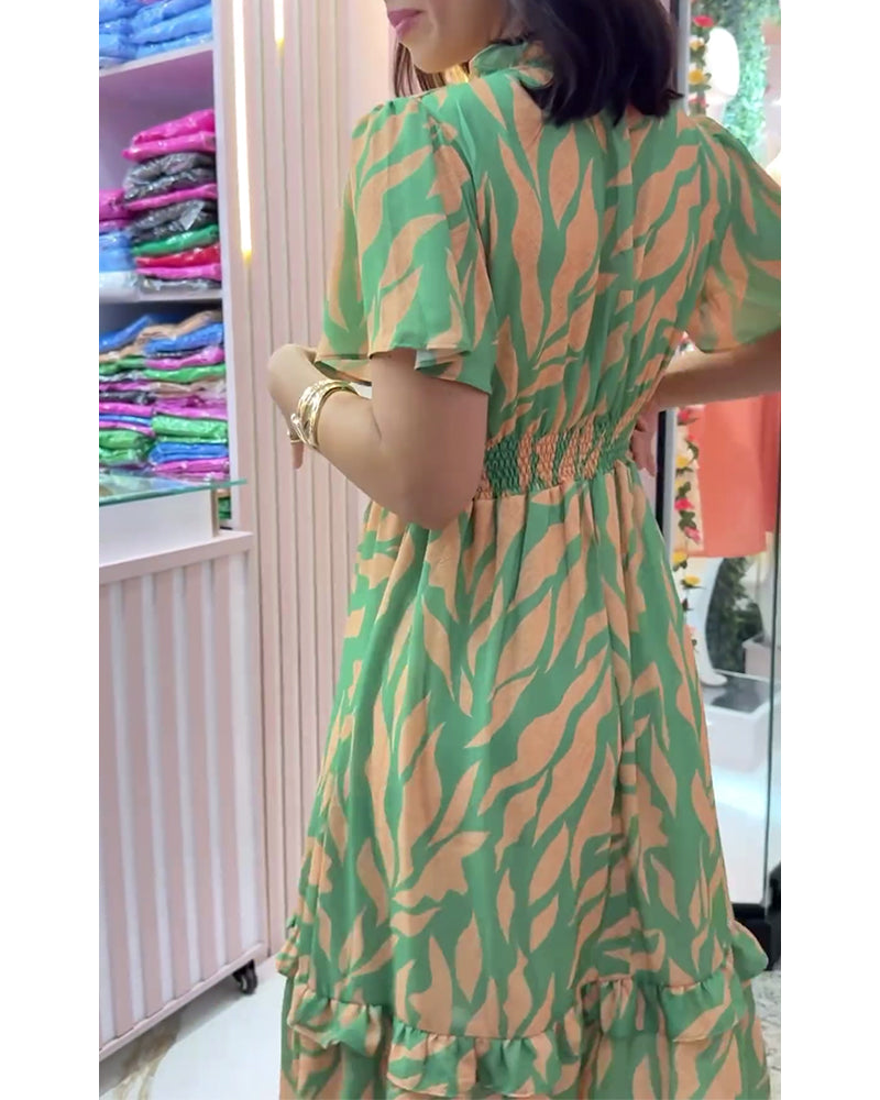 Robe élégante imprimée à la taille