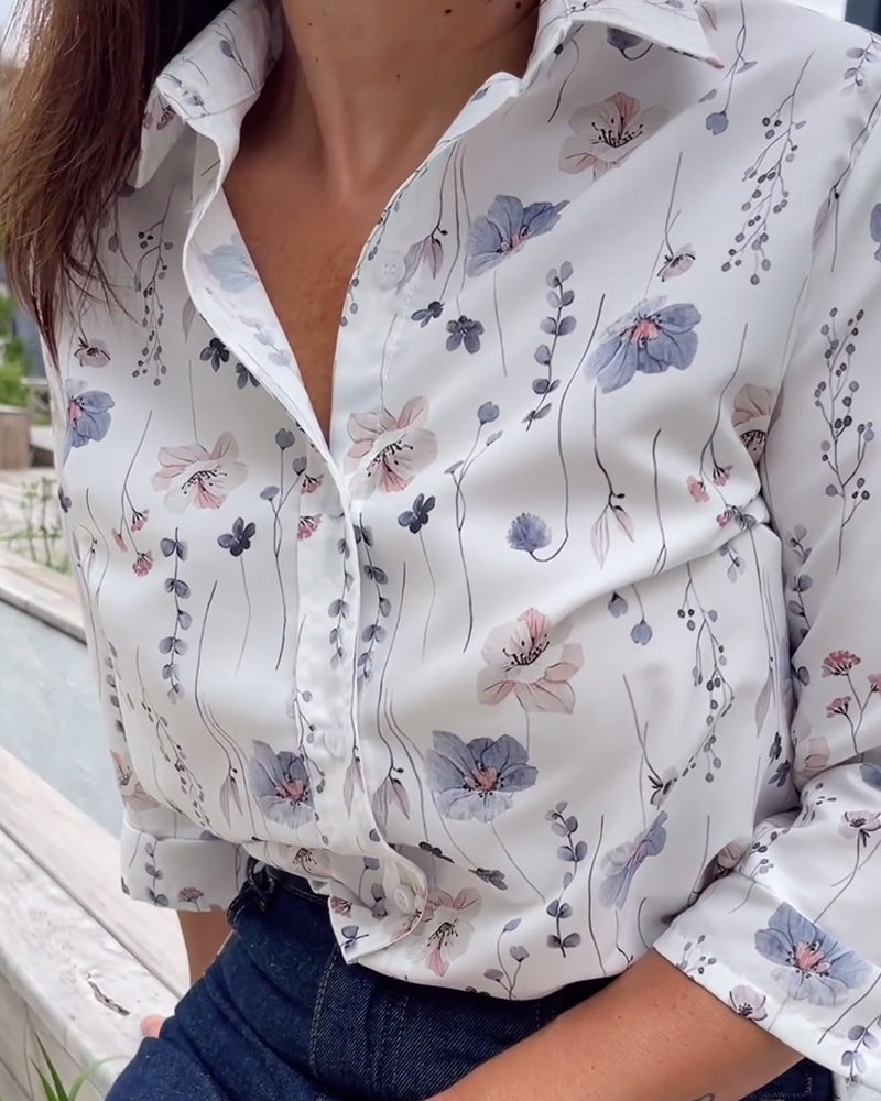 Chemise élégante à manches trois-quarts à revers et imprimé floral