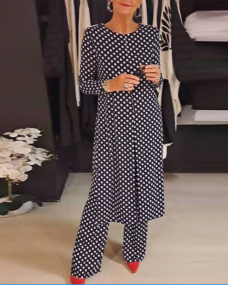 Costume élégant fendu à pois