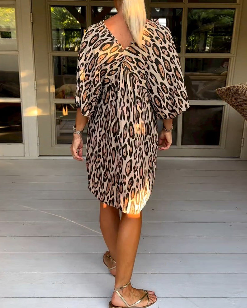 Robe léopard col V