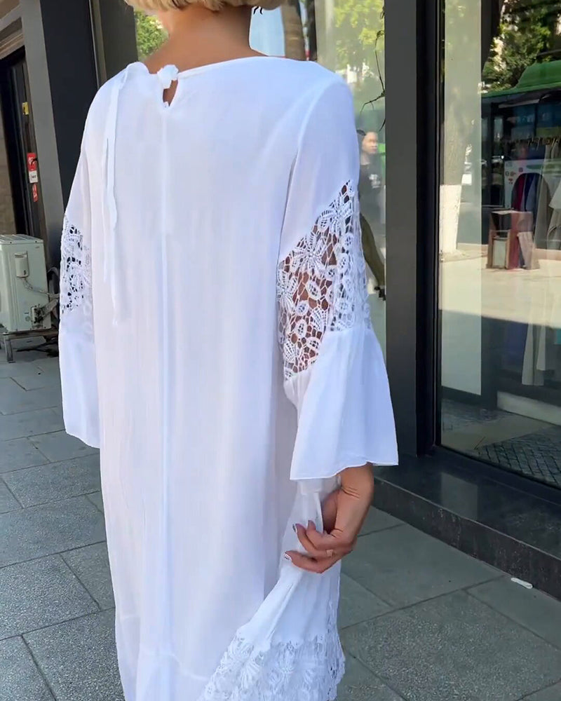 Robe en dentelle à col rond