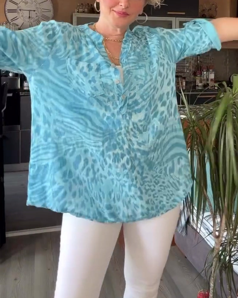 Blouse imprimée col V poche boutonnée manches trois-quarts