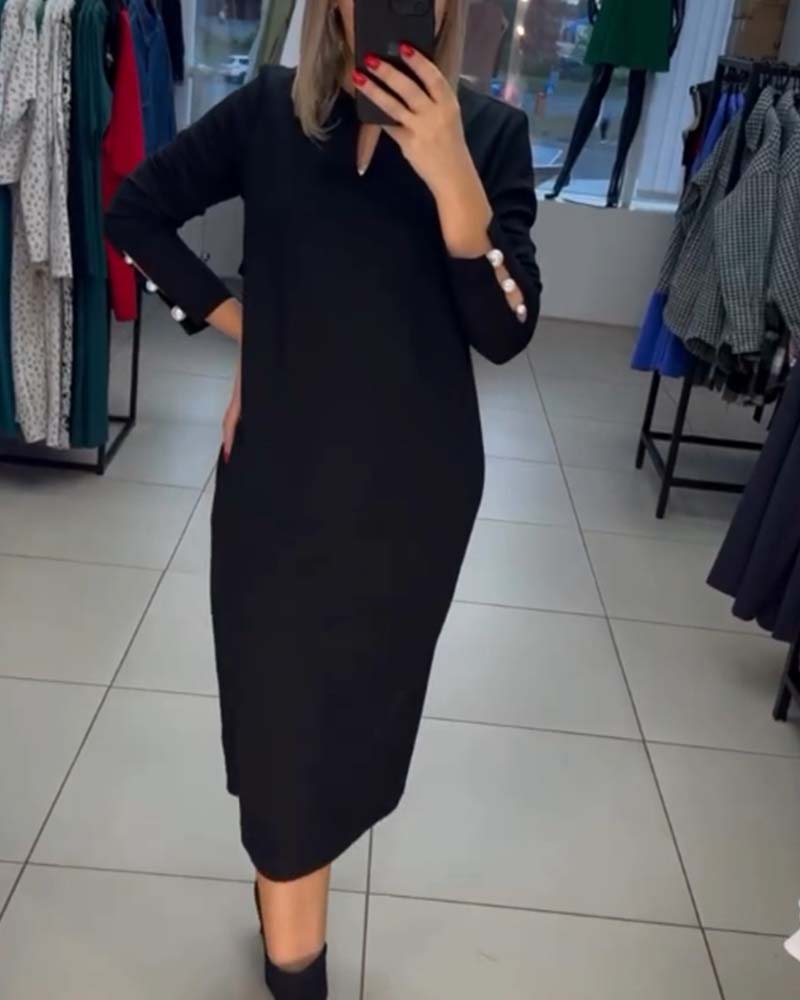 Robe élégante avec boutons en perles