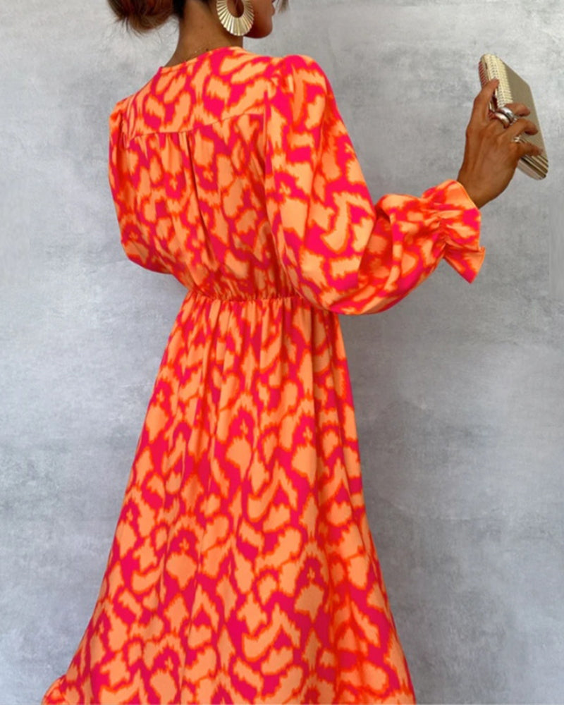 Robe élégante à manches bouffantes et fente boutonnée avec col imprimé