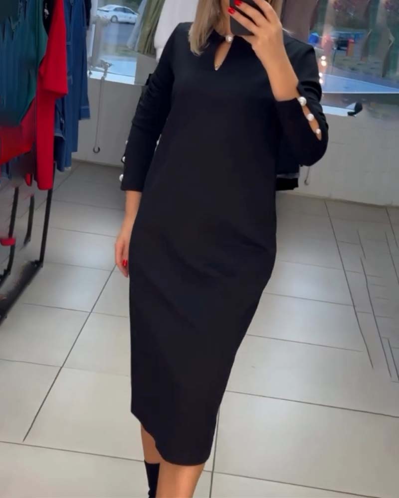 Robe élégante avec boutons en perles